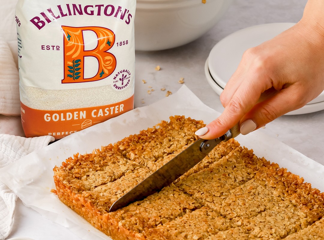 Some delicious flapjacks alongside a pack of Billington's Golden Caster sugar